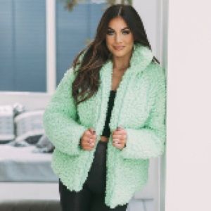 these three green teddy coat
